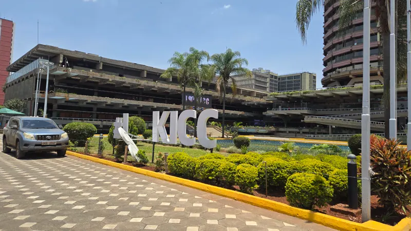 Large white KICC letters in the gardens of the Kenyatta International Convention Centre
